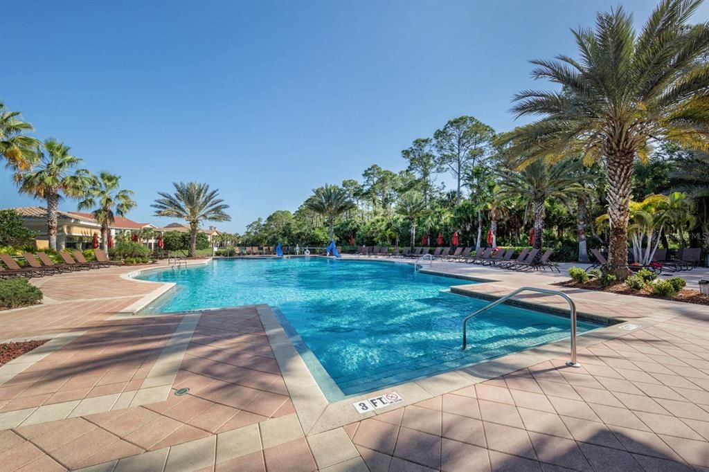 Resort pool with Tiki Bar at the far left side of photo.