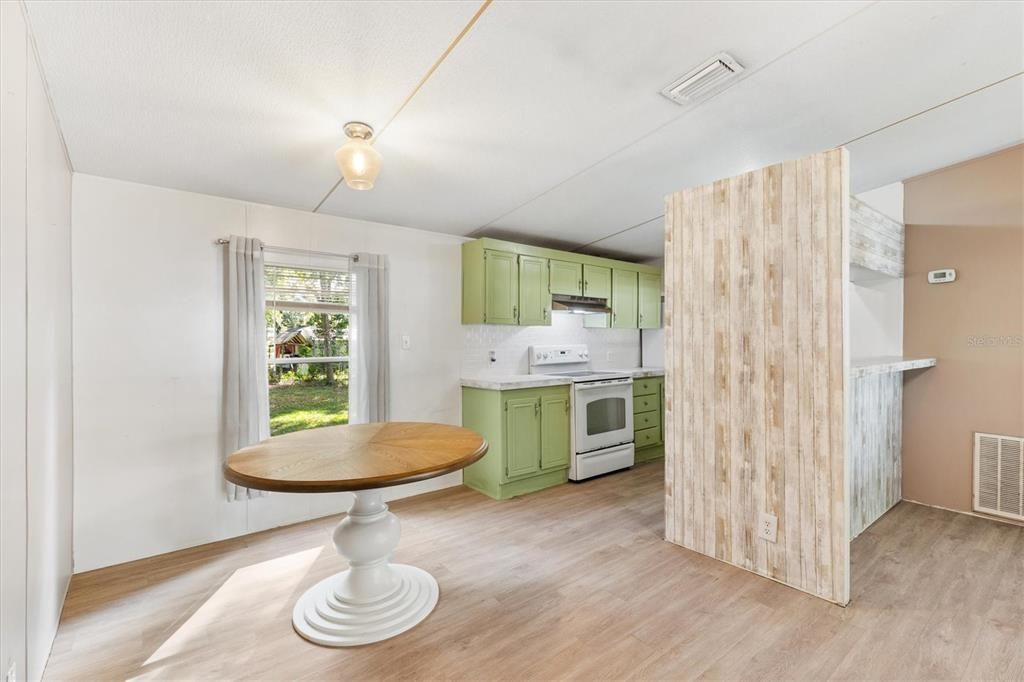 View of Dining Area and Kitchen