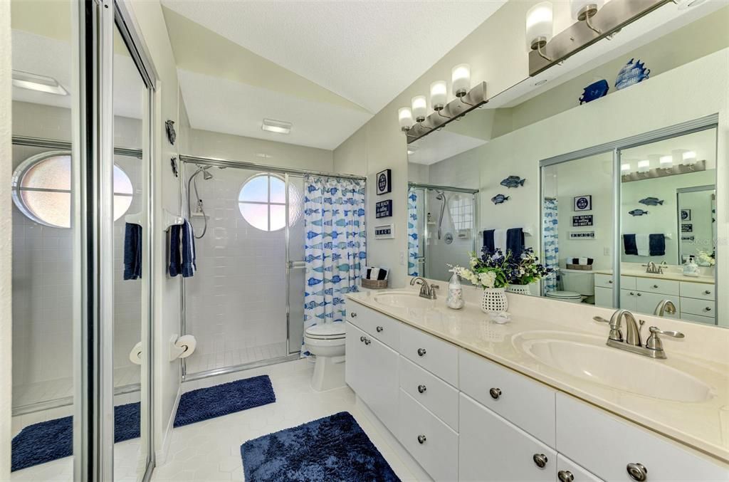 Your Master Bath has a large walk-in closet across from the sinks.