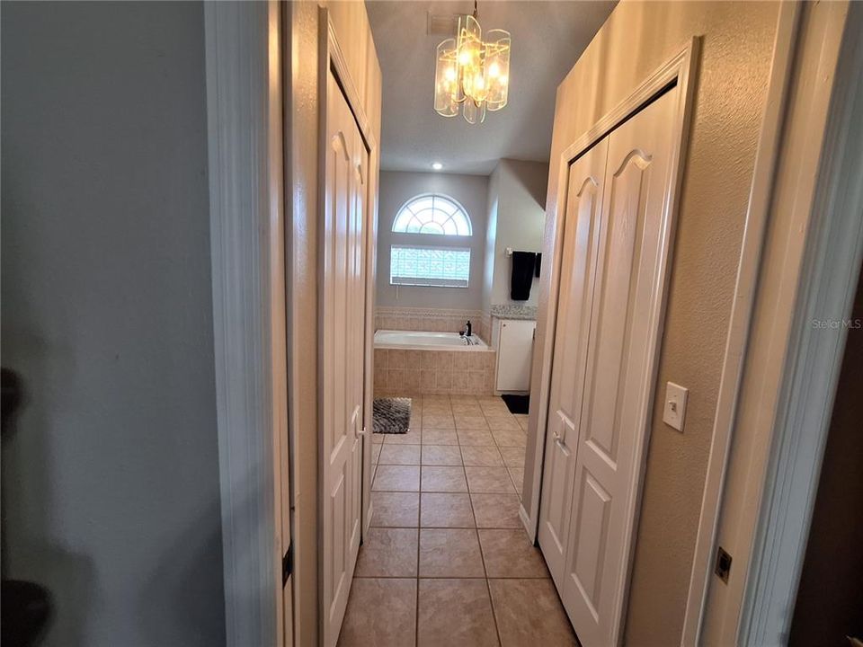 Bathroom Suite and Double Walk in Closets