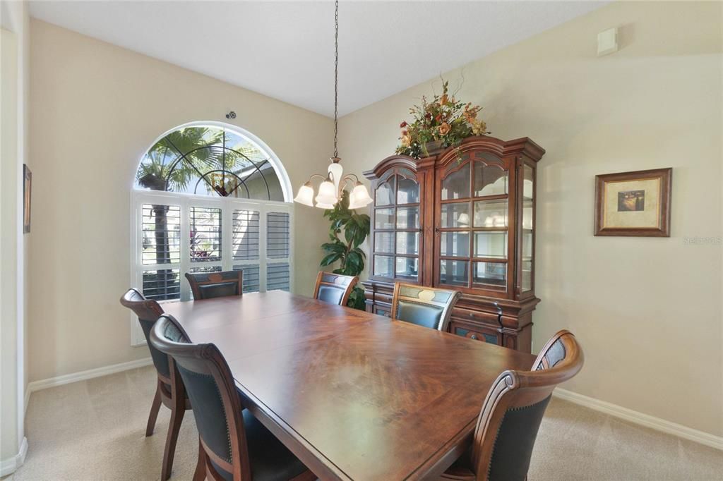 Front dining room w/ plantation shutters