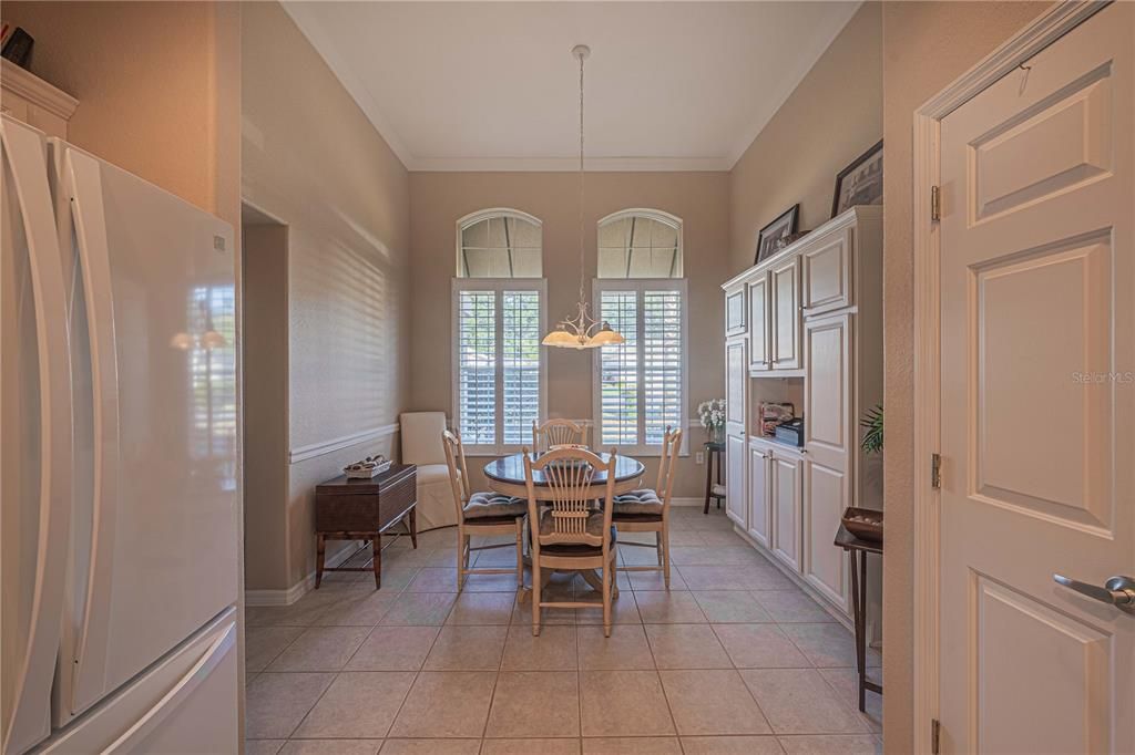 SOARING CEILINGS AND WINDOWS WITH PLANTATIONS SHUTTERS