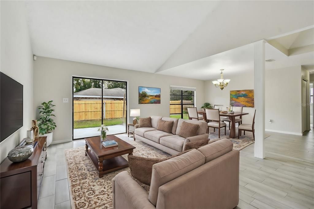 Living room with high ceilings and lots of natural light