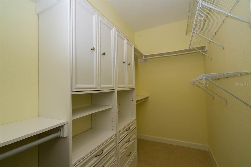 WALK-IN CLOSET IN MASTER BEDROOM