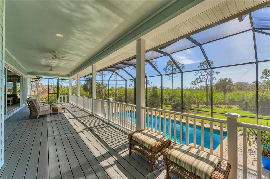 12' wide balcony overlooking pool lanai, and waterfront.