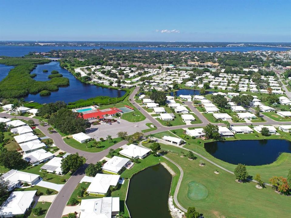 Golf course, community center, and river beyond.