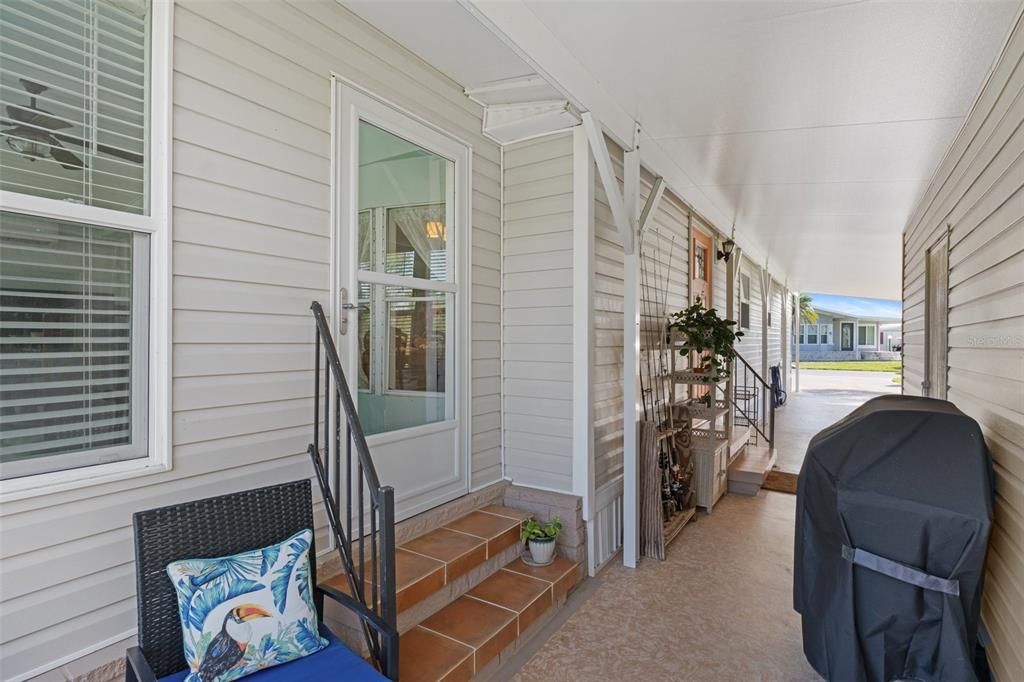 Florida room entrance in carport.