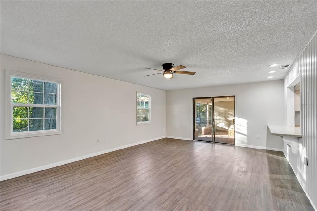 Family Room with Fan and Sliders