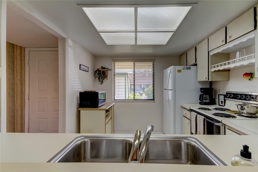 Looking into the kitchen thru the serving window..