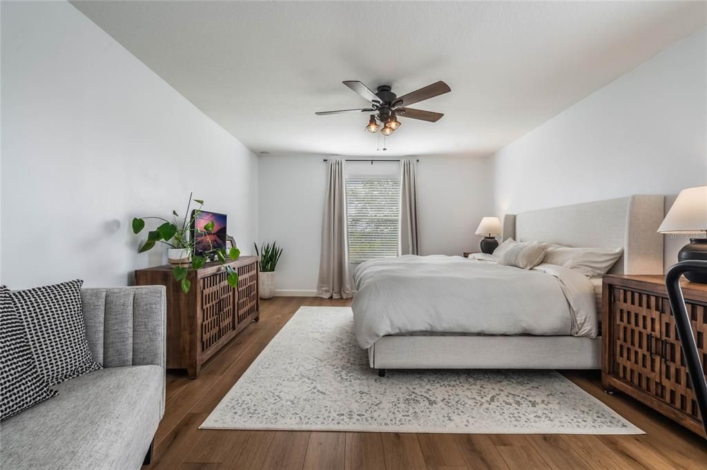 Primary Bedroom w/ backyard view