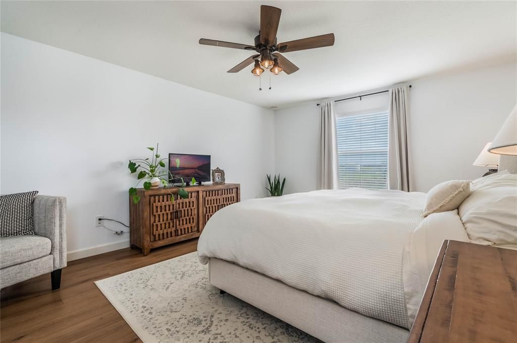 Primary Bedroom w/ backyard view