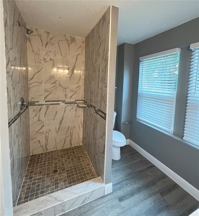 Bathroom 1. Newly renovated shower.