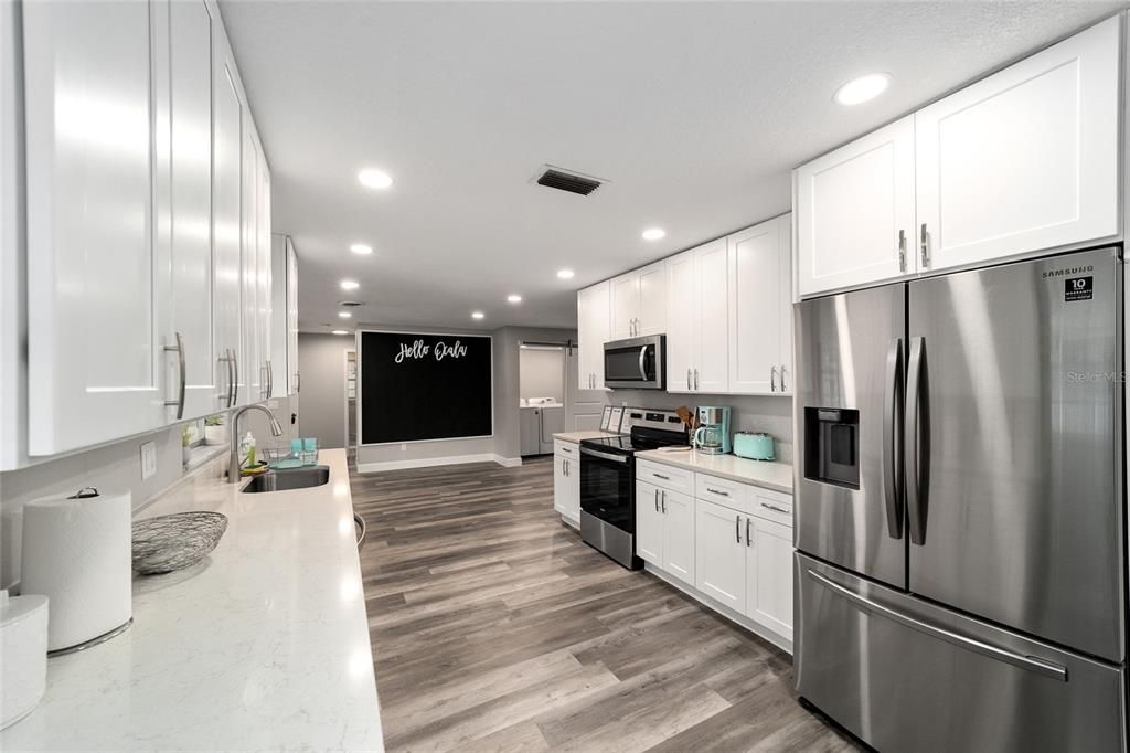 Newly updated galley Kitchen with quartz