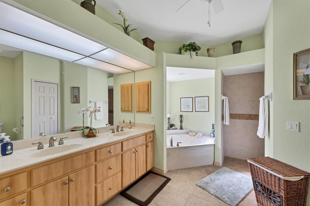 Master Bath features a walk in shower, soaking tub, dual sinks & separate commode (comfort height)