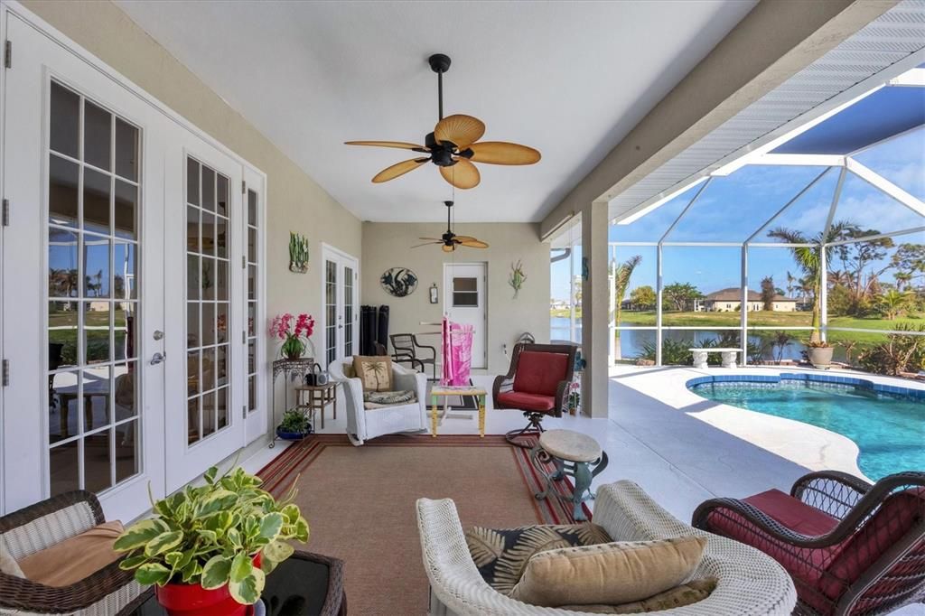 Covered lanai offers plenty of room for entertaining family & guests