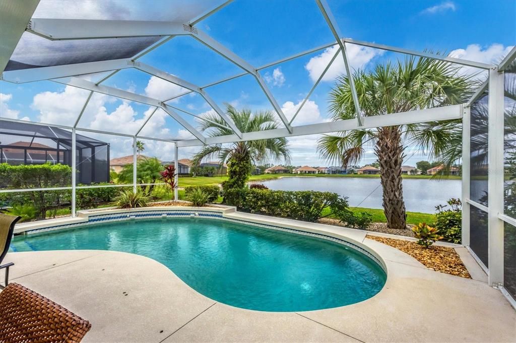 Take a dip & relax in your heated pool while taking in the expansive lake views