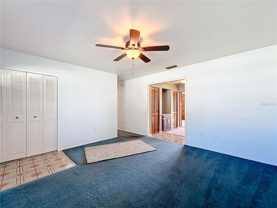 Coat closet as you enter and looking towards the kitchen