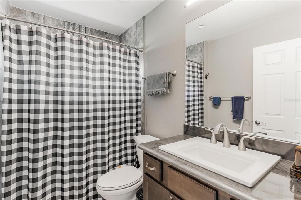 Guest Bathroom with Tub and Shower Combo