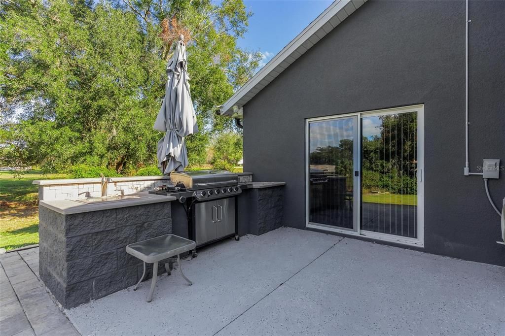 Outdoor Grilling Area with a Sink