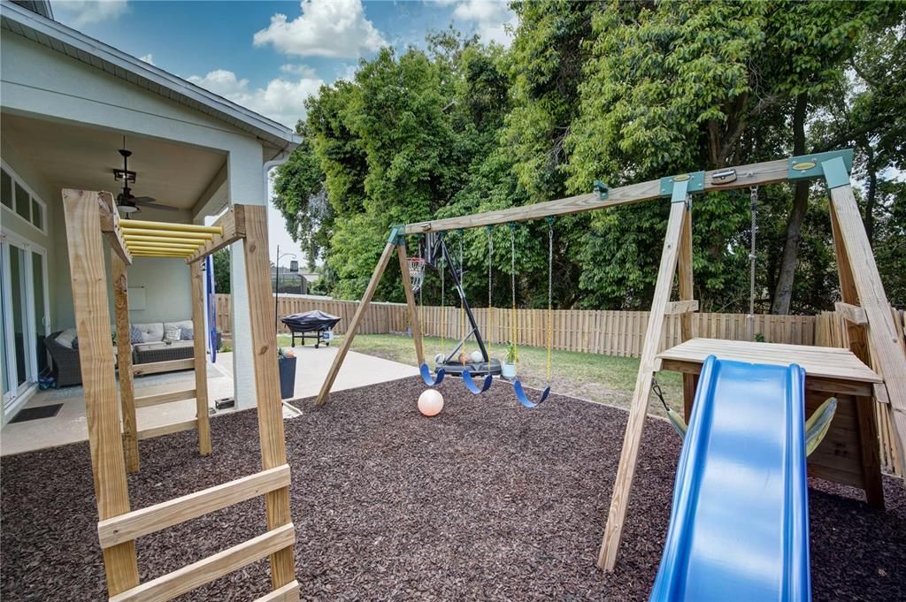 Commercial grade playground set with rubber mulch installed 2022