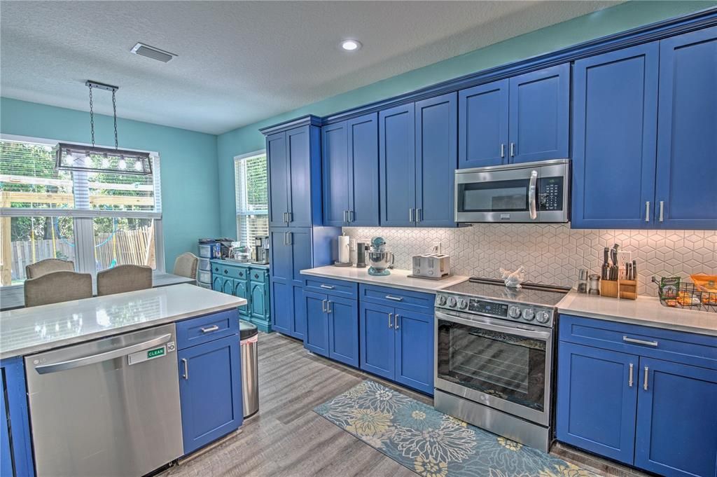 Open concept kitchen and dining area