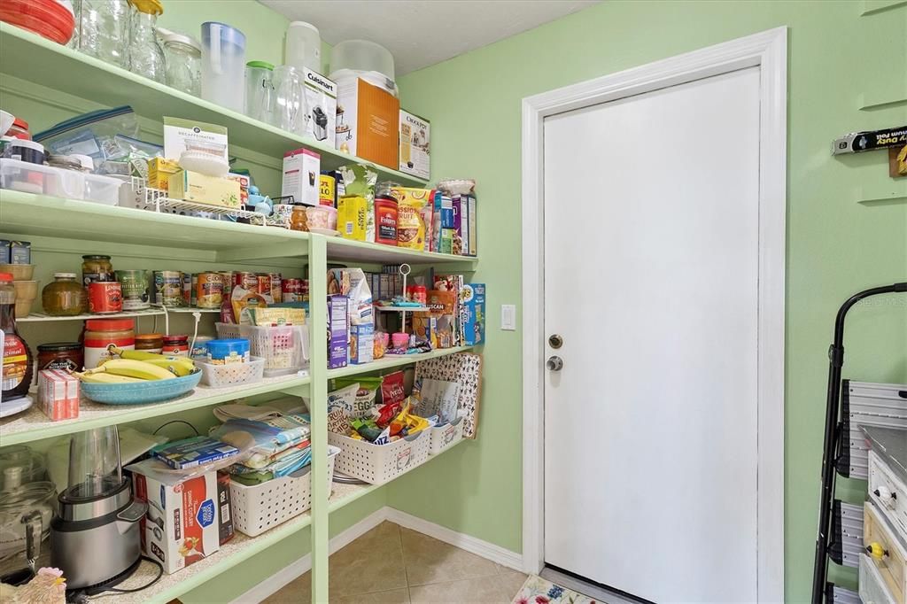 Walk-in pantry or mudroom from garage