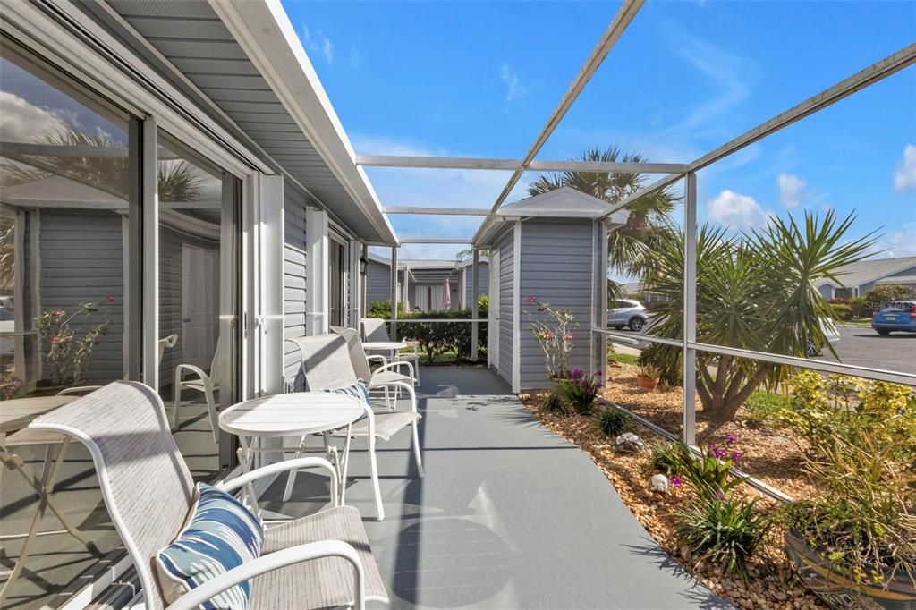 FRONT SCREENED PORCH, CEMENT FLOORING HAS BEEN RECENTLY PAINTED