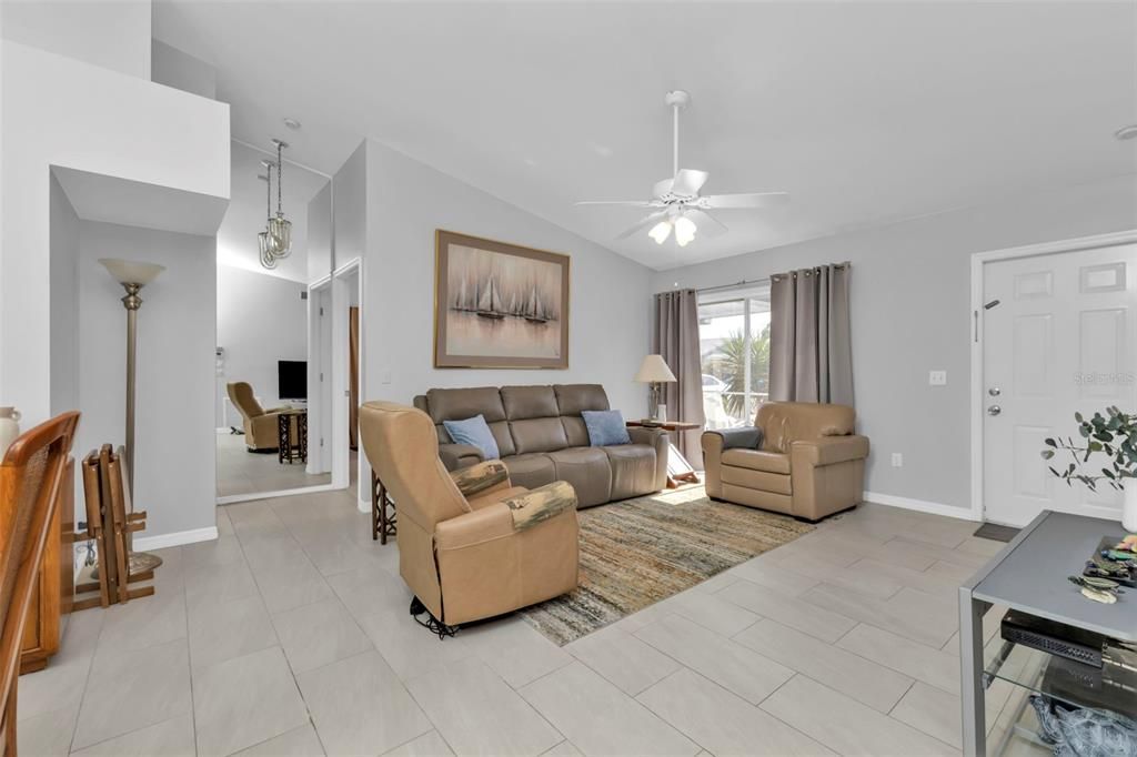 VAULTED CEILINGS AND UPDATED PORCELAIN TILE IN LIVING AREAS