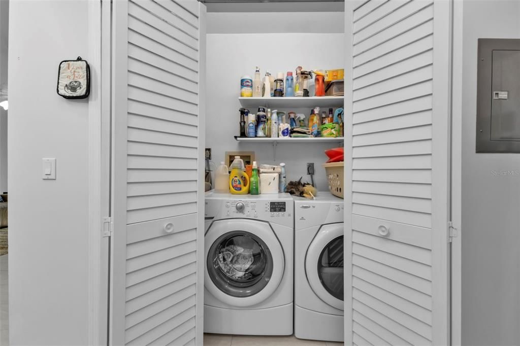 FRONT LOAD WASHER AND DRYER IN CLOSET OFF KITCHEN