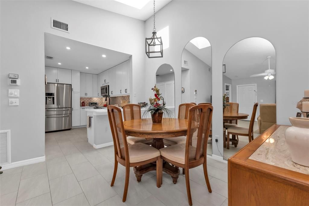 IMPACT RATED SKYLIGHT IN THE DINING ROOM BRINGS IN LOTS OF NATURAL LIGHT