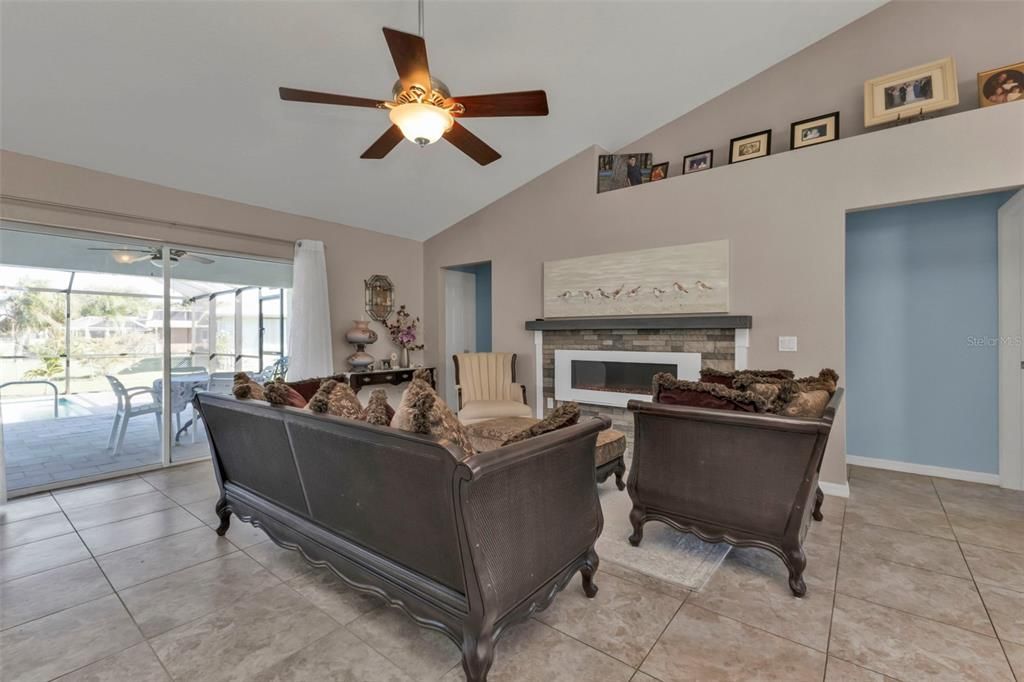 Great Room with sliders leading to pool & lanai