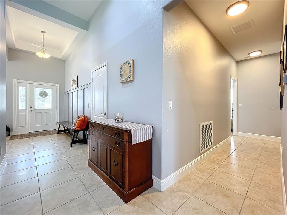 Foyer and entrance to 2nd primary bedroom, 3rd bedroom and 4th bedroom