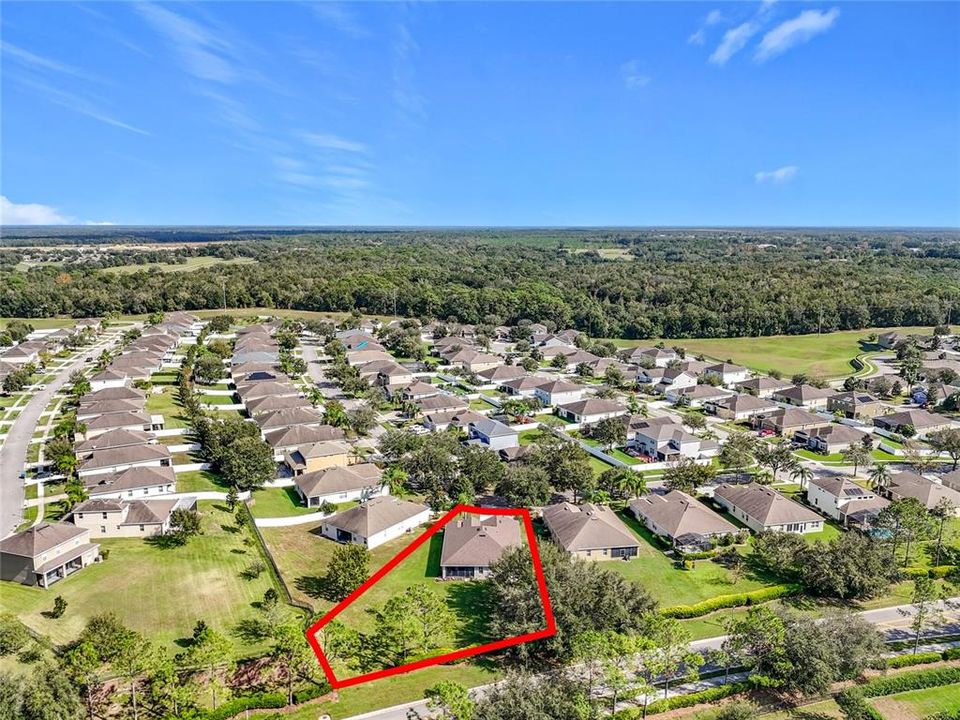 Aerial of home, lot and surrounding area