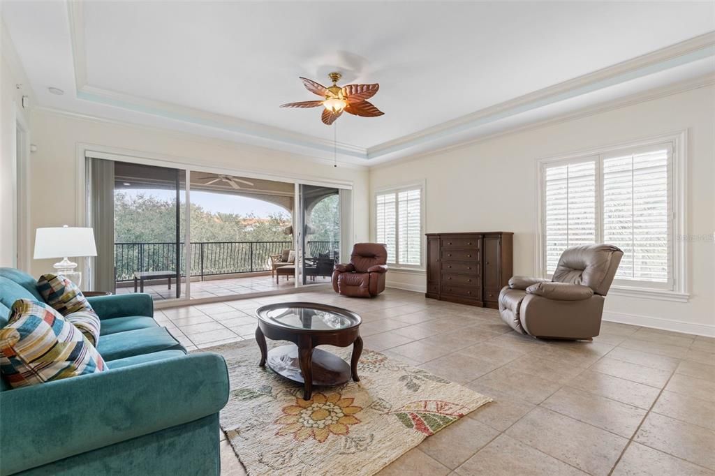 Open and bright living room with sliders to balcony