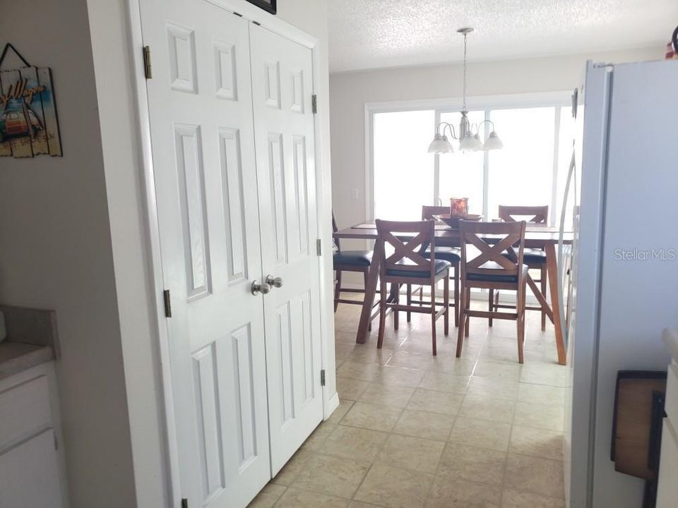 view into dining room from kitchen