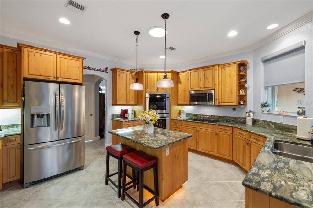 Kitchen with double ovens and cooktop