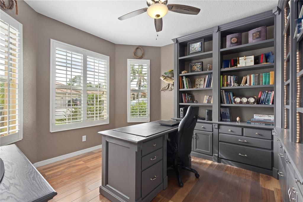 Den or office off the front of the home with built-in bookcase