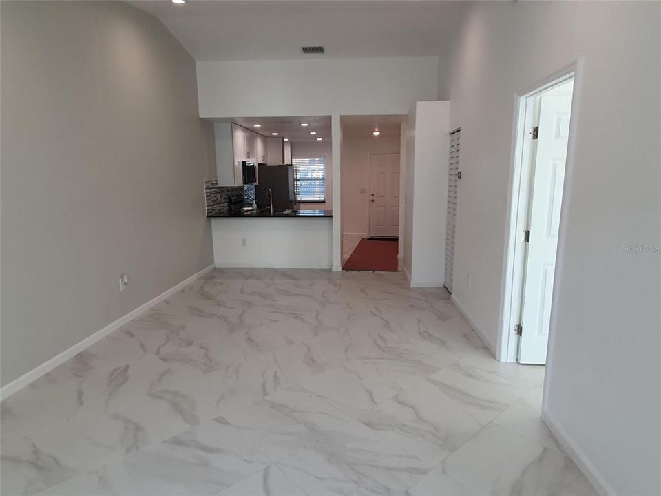 Living room facing kitchen