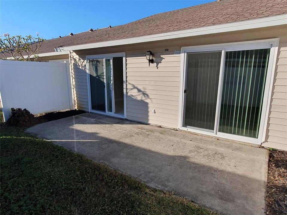 Patio facing living room left and master bedroom right