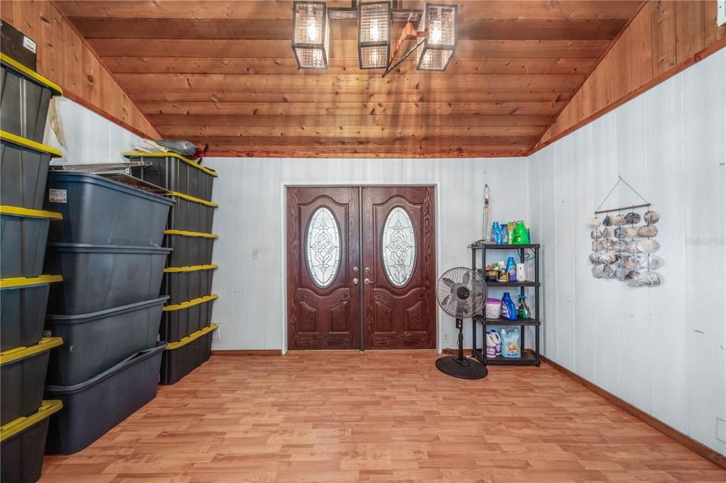 dining room opens to the screened in porch