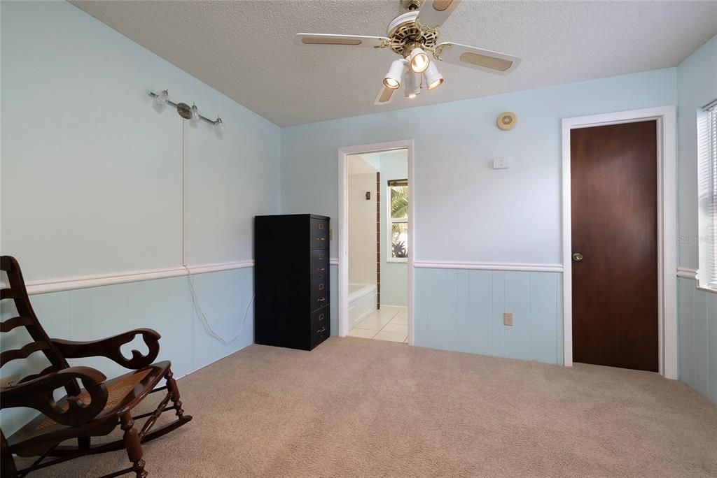 den/sitting area in the primary bedroom  with bath #2