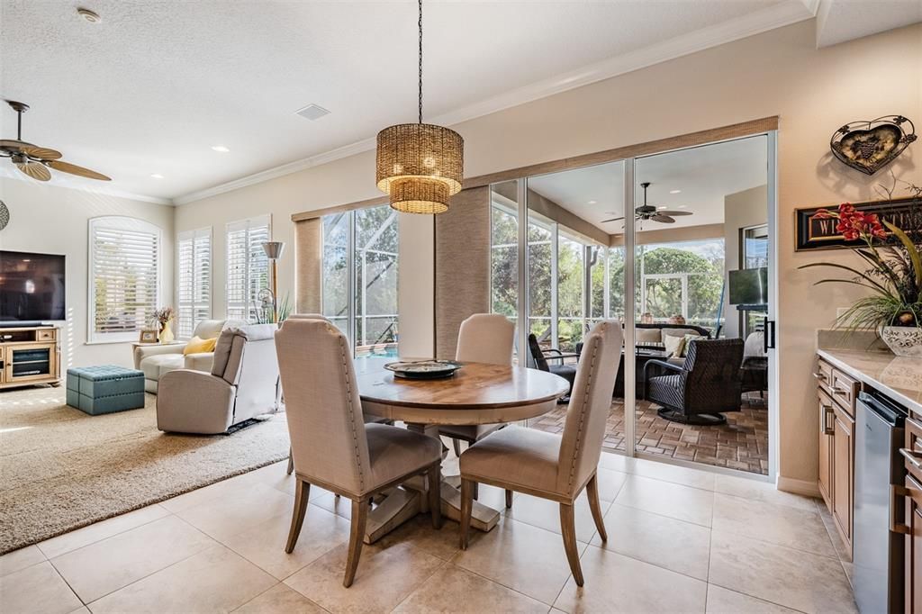 Dinette area open to the Great Room, Kitchen and Pool area.