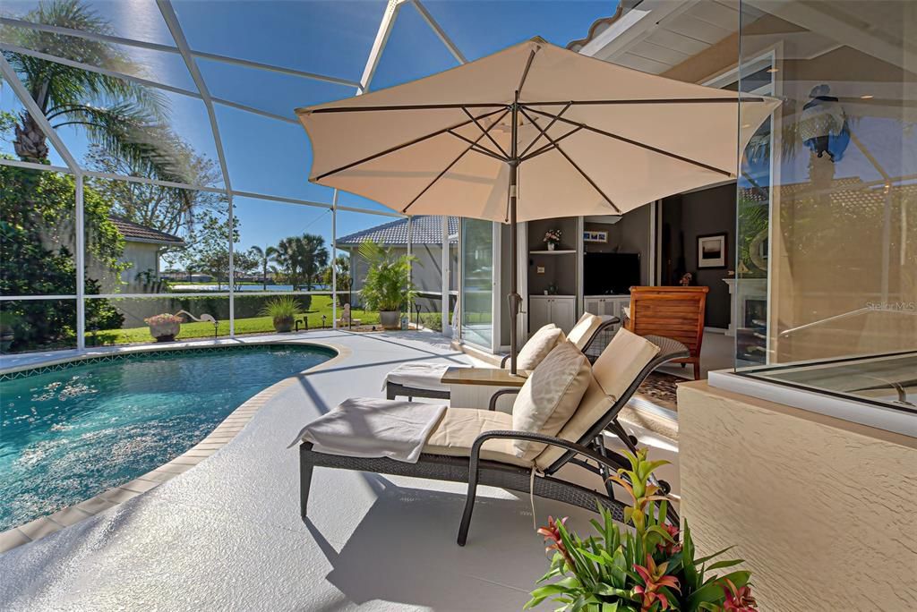 Nap or read a favorite book poolside, enjoying the wonderful Florida weather and tranquil water view.