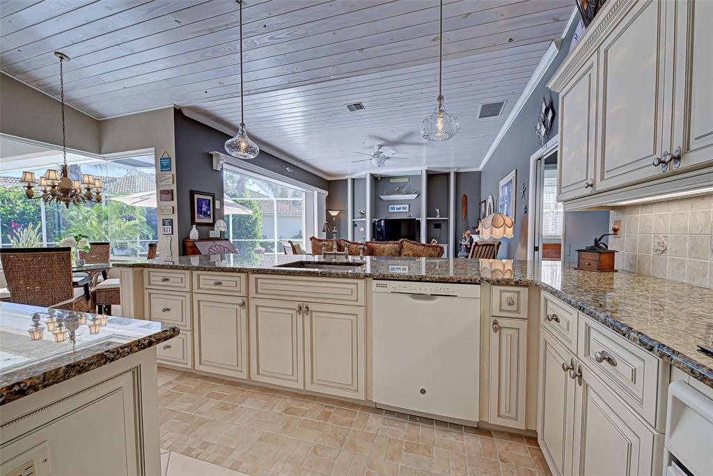 Kitchen opens up to the family room and sunny breakfast nook, making entertaining so easy.