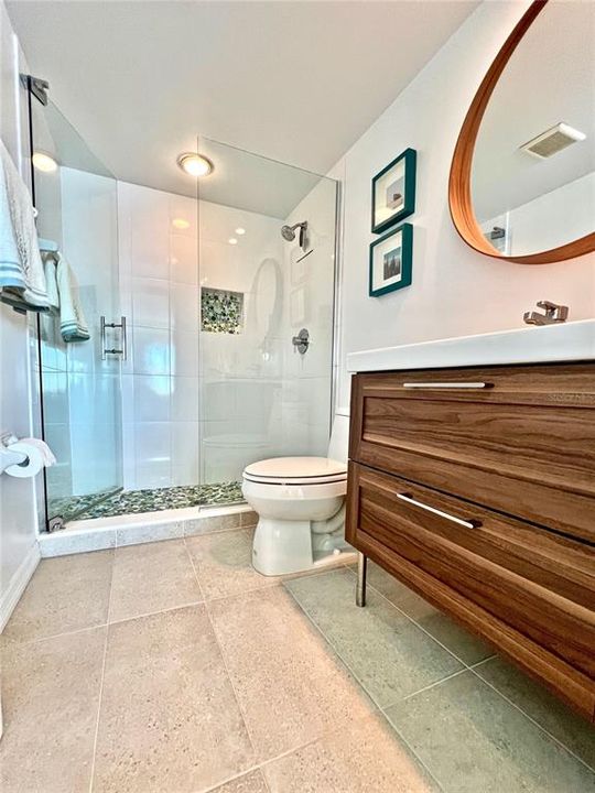 Remodeled master bathroom with shower