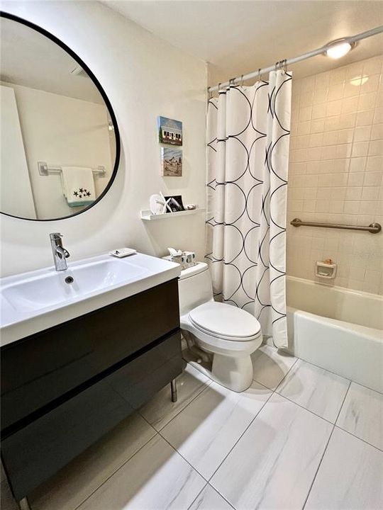 Guest bathroom with tub