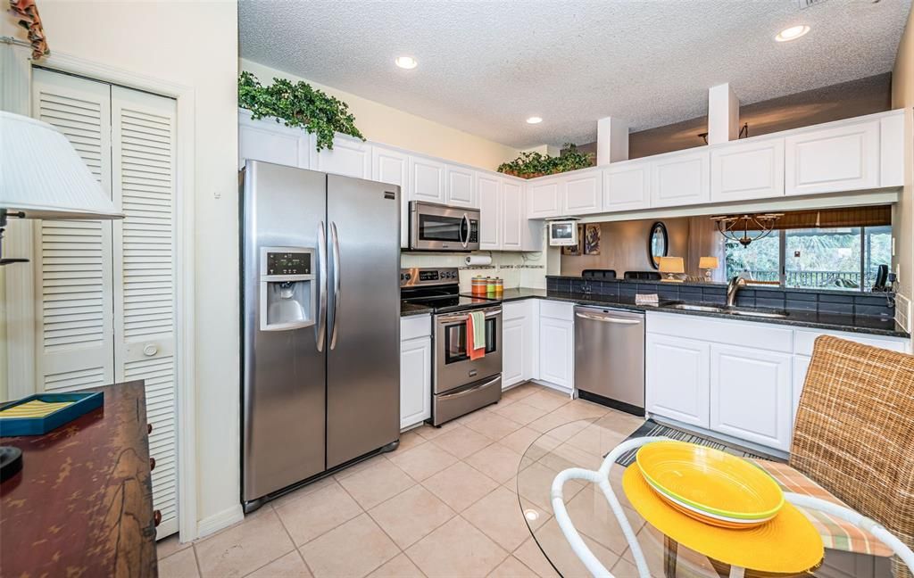 .. Kitchen Shot # 8.... Perfect Open Kitchen Design.. Perfect for entertaining with open Look to Living Room from Kitchen..