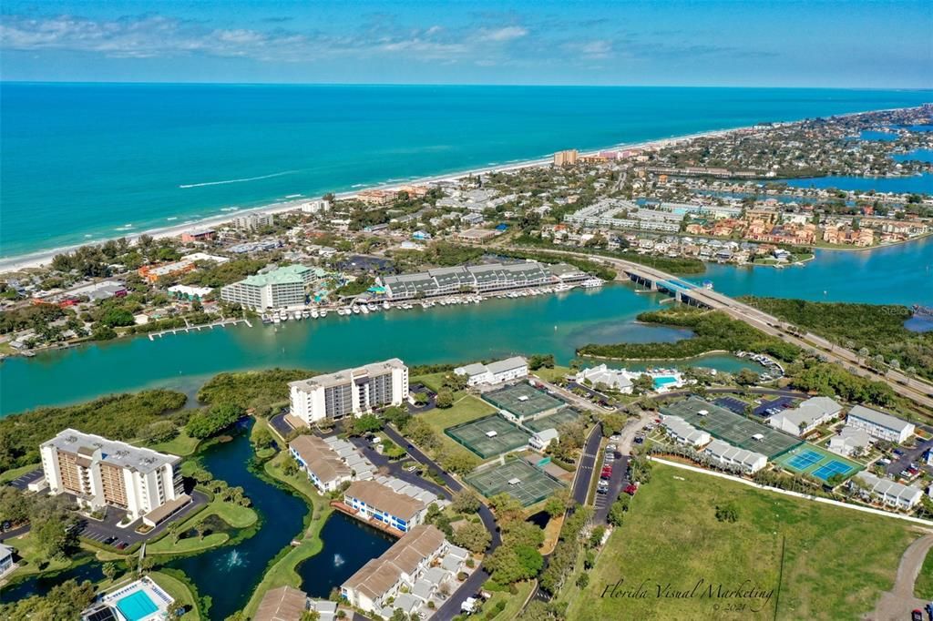 ... Aerial of Shipwatch Looking North West.. Easy Walk to Indian Rocks Beach. There are over 20 Restaurants on IRB just over the Bridge..