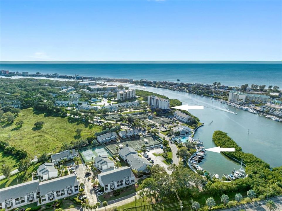 .. LIFE AT SHIPWATCH ..  Shipwatch Aerial Looking SW-  with Arrows over the Private Boat Marina and the Har - Tru Tennis Courts..