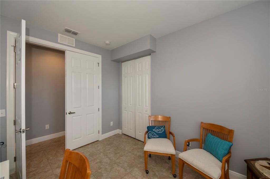 3rd bedroom with French doors and closet